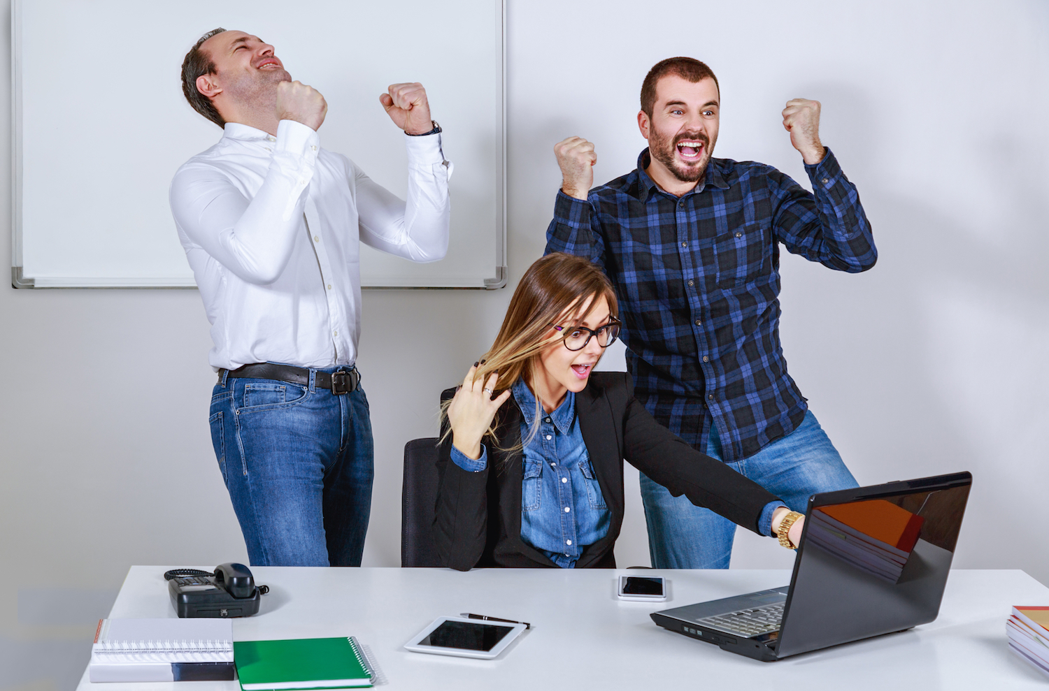 Successful business people hands up